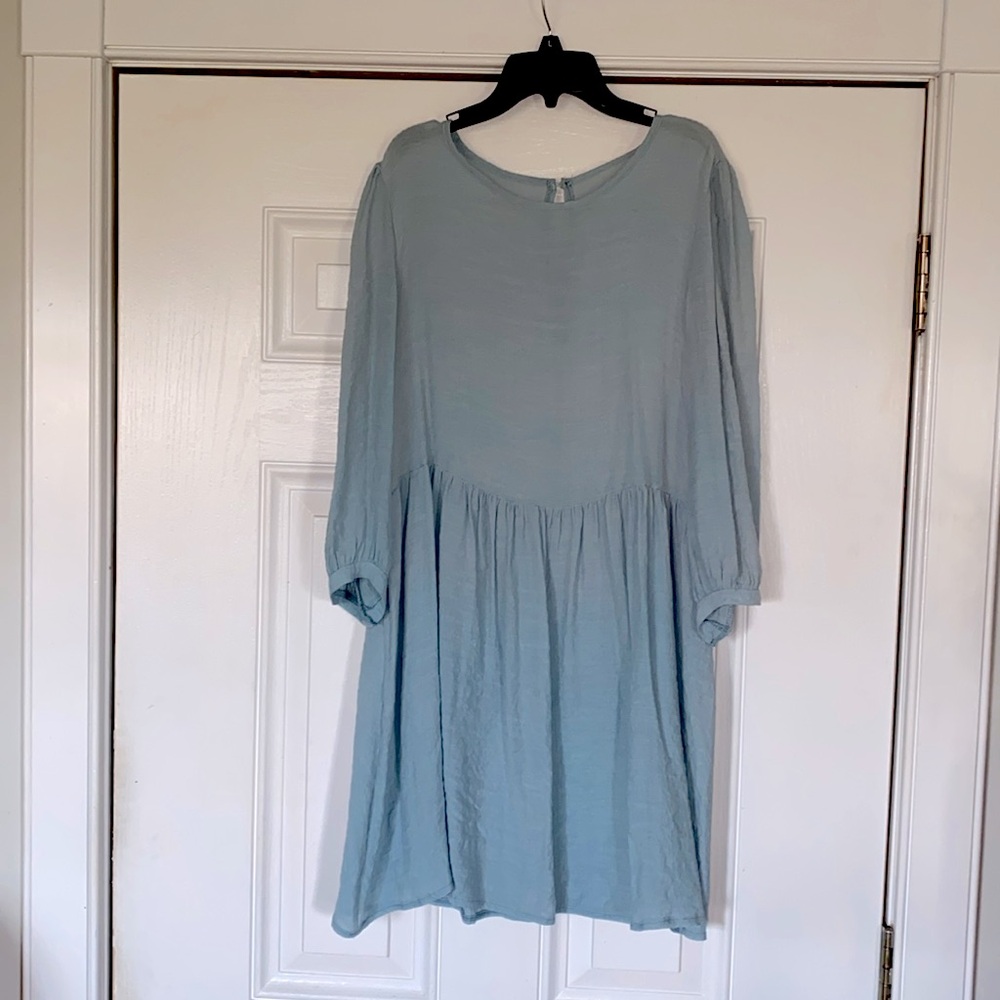 Tunic or knee length dress. Dusty blue see thru crape